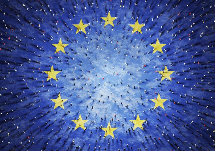 Crowd of people on European Union flag