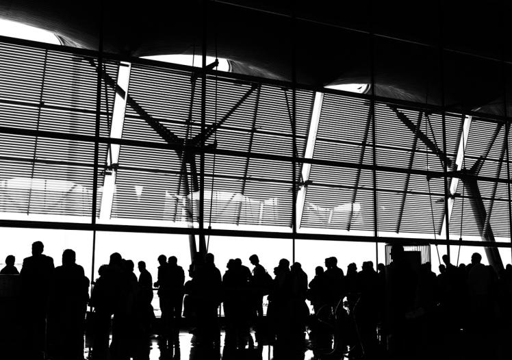 ilhoutte of passenger check-in at the airport