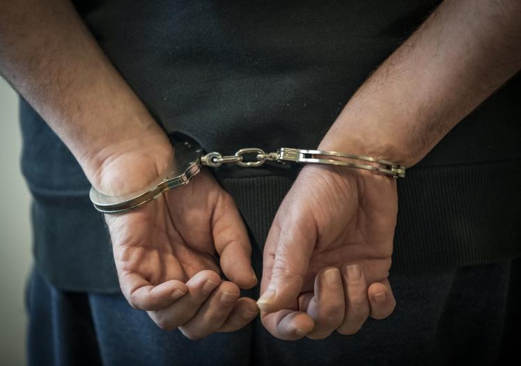 Arrested man - handcuffed