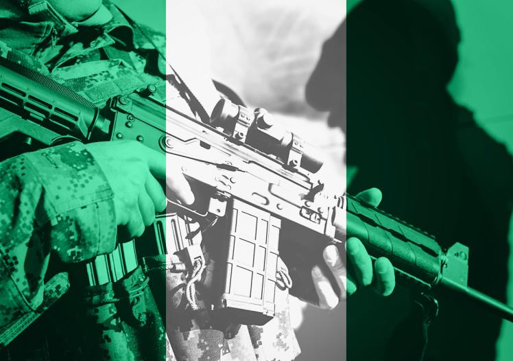Gun and Nigerian flag