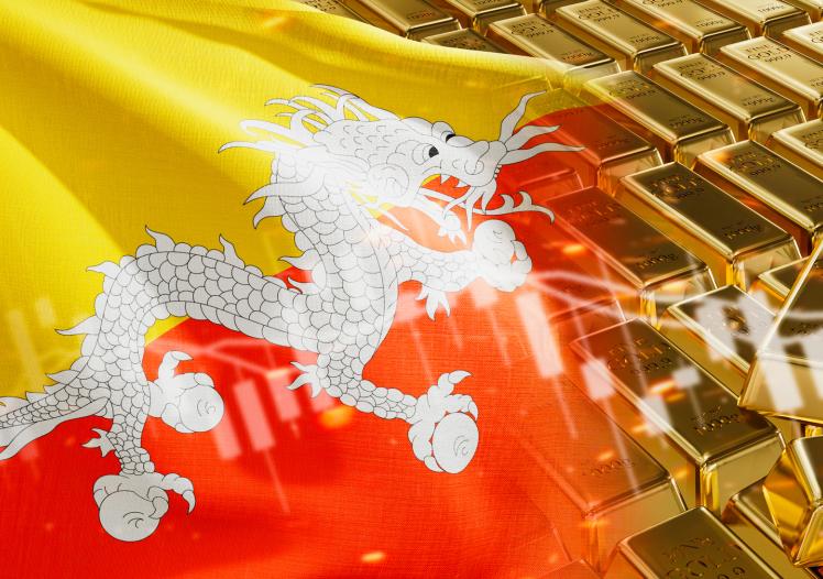 Gold bars with Bhutan flag