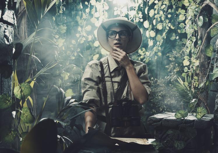 Scared explorer lost in the jungle 