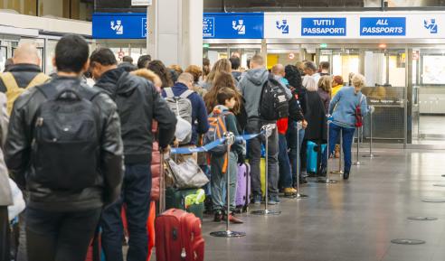 Long immigration queue at Malpensa Airport in Milan, Italy for arrivals of Non-Schengen travellers 