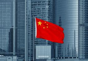 Chinese flag with skyscrapers