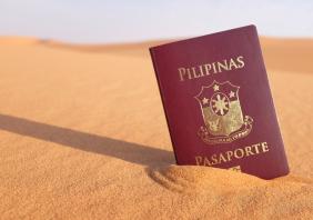 Philippine passport in a desert