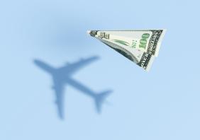 Paper plane made of a US 100 dollar bill 