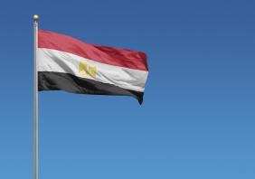Egyptian flag against blue sky