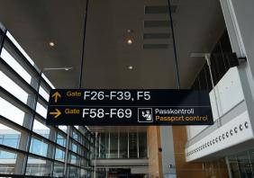 Passport control and customs sign at a Swedish airport