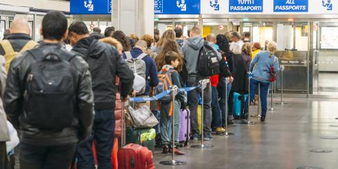 Long immigration queue at Malpensa Airport in Milan, Italy for arrivals of Non-Schengen travellers 
