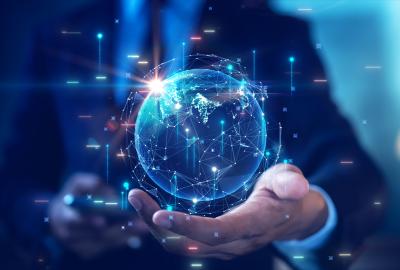 Male businessman holds abstract world with rapid growth of digital and economic technology. business contact concept Global Internet network communication connection. Internet of Things IOT. 