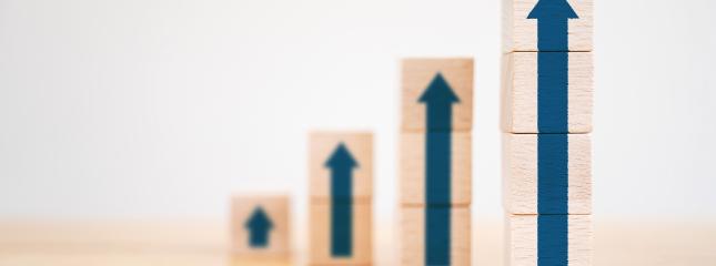 Ladder career path for business growth success process concept.Wood block stacking as step stair with arrow up stock photo