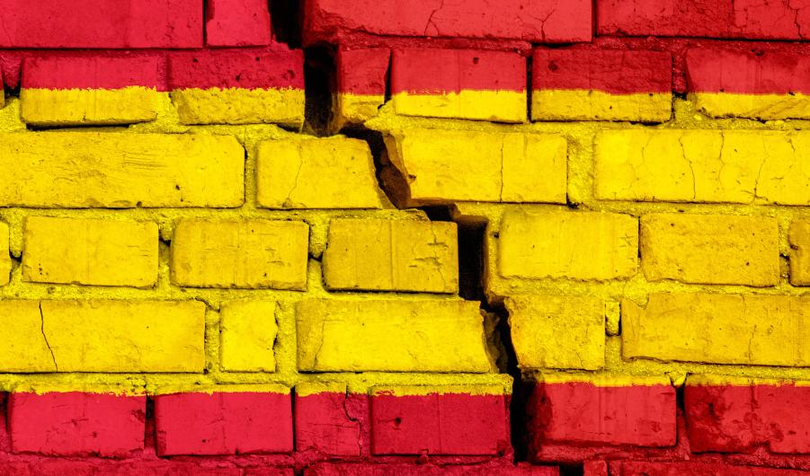Spanish flag on brick wall
