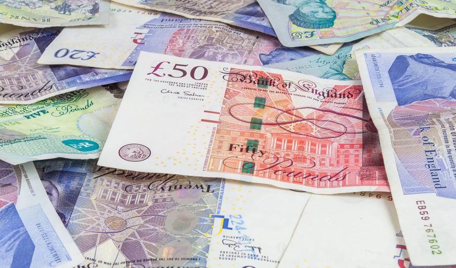 British pounds banknotes background stock photo