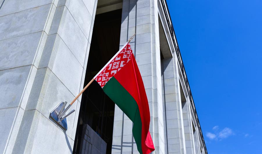 Belarusian flag on the wall of the Palace of Independence