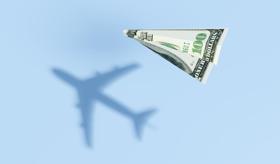 Paper plane made of a US 100 dollar bill 