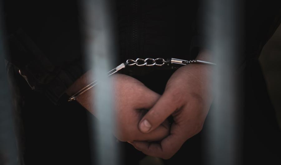 Handcuffed prisoner