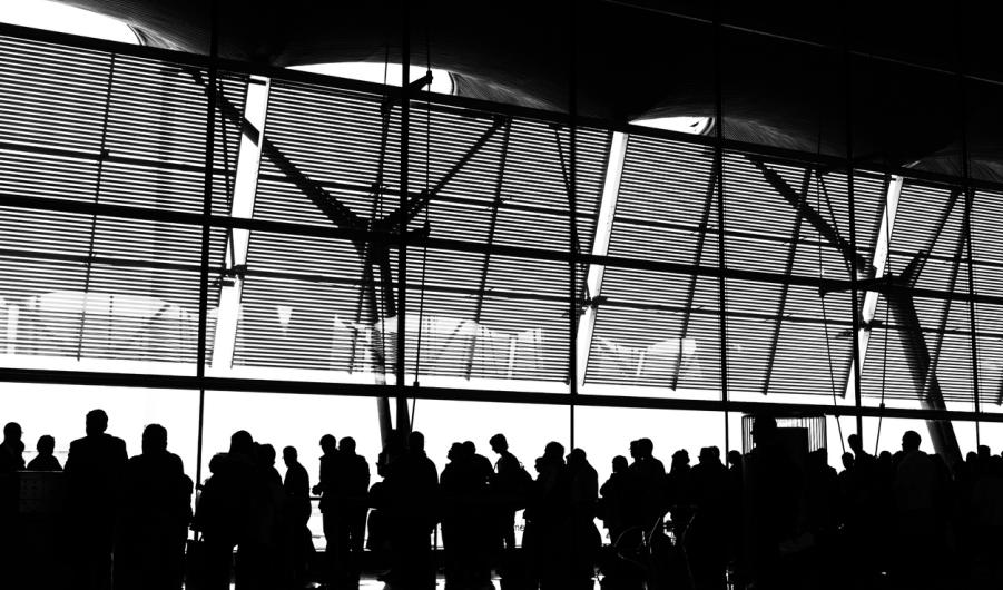 ilhoutte of passenger check-in at the airport