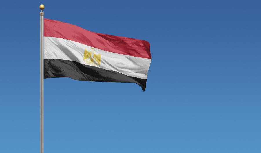 Egyptian flag against blue sky