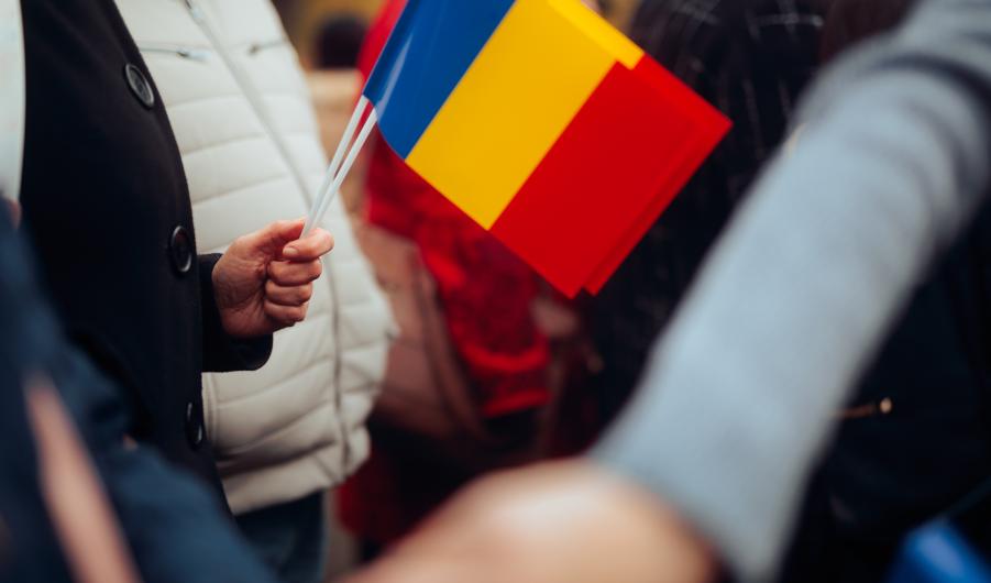 People Waving Flags at the Great Union Day parade in Romania