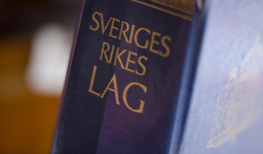 The collected laws of Sweden in a blue book in close-up