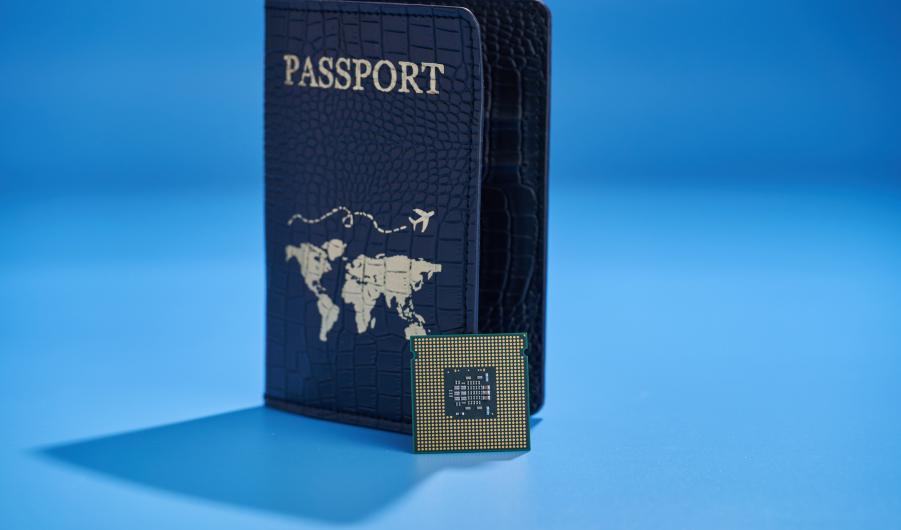 Passport with world map and computer chip